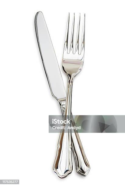 Silver Fork Sitting Across A Silver Knife Stock Photo - Download Image Now - Fork, Silverware, Table Knife