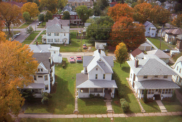 houses in small town Iowa 1985, retro Aerial view of small town Iowa, USA. 1985. Agfachrome scanned film with grain. iowa stock pictures, royalty-free photos & images