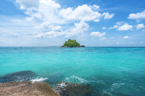 istock Small tropical island in the ocean 1175354054