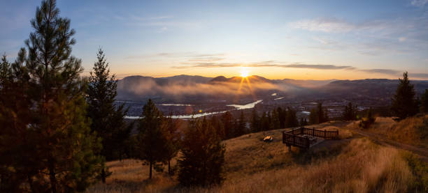 Kamloops Sunrise Beautiful Panoramic View of a Canadian City, Kamloops, during a colorful summer sunrise. Located in the Interior British Columbia, Canada. kamloops stock pictures, royalty-free photos & images