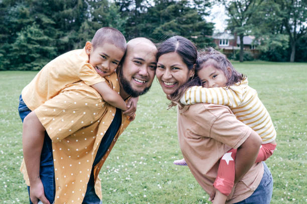 istock Family with two kids on playground 1175357545