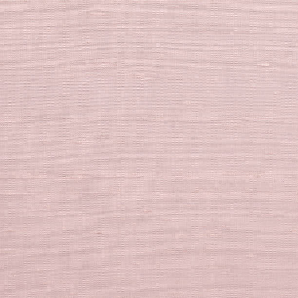 istock Woven cotton linen fabric textile textured backdrop in pastel light sweet romantic pink red color tone 1175357623