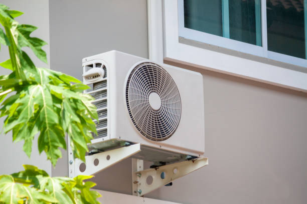 istock Air conditioner compressor outdoor unit installed outside the house 1175357671