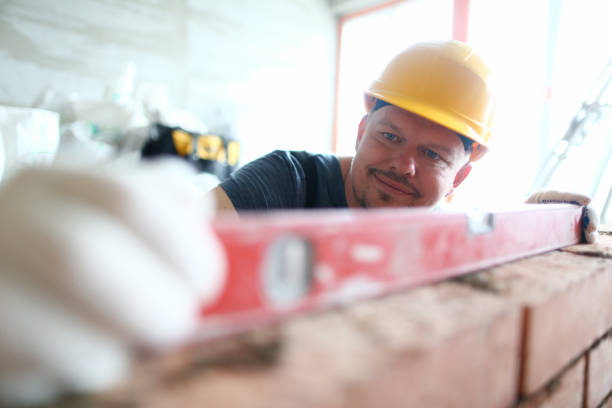 istock Pedantic male in hardhat 1175357946