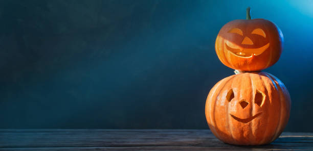 istock Halloween pumpkin on dark background 1175358088