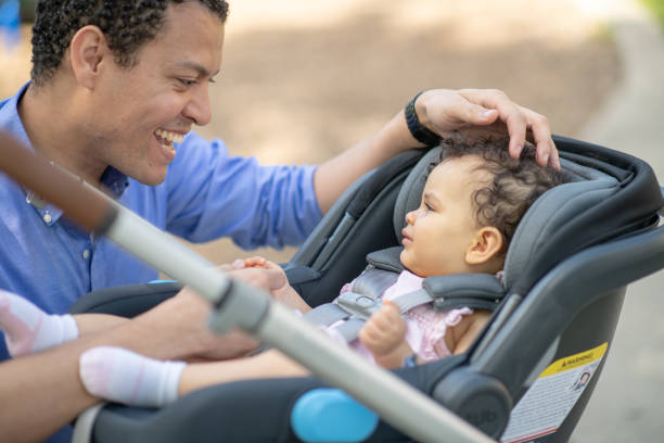 istock Father takes baby daughter on a walk 1175358245