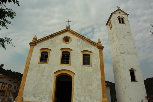 View of a tourist walking to the entrance of a church in La Palma, Canary Islands