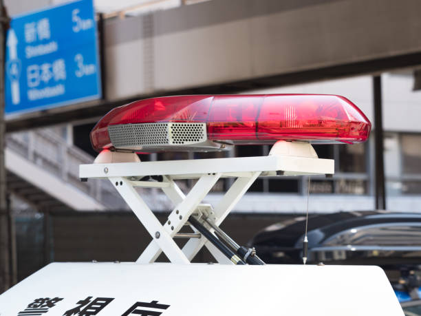 istock Police car red rotating light 1175374167