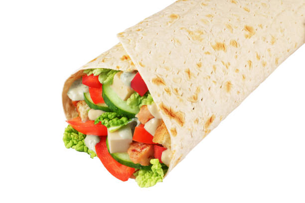 Wrap sandwich isolated on white background Wrap sandwich with nappa cabbage, feta cheese, pepper, chicken, sauce, cucumbers, tomato isolated on white background pita bread isolated stock pictures, royalty-free photos & images