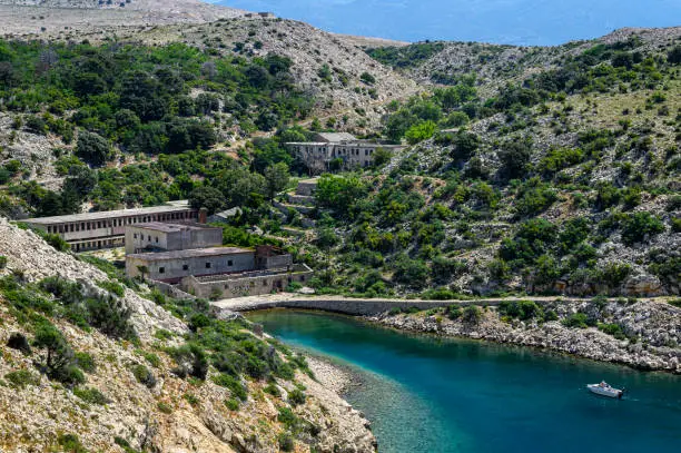 Goli otok (Naked Island) was a political prison in ex-Yugoslavia. Conditions were very harsh, many people died and underwent brutal physical and mental torture. It was impossible to escape from it.
