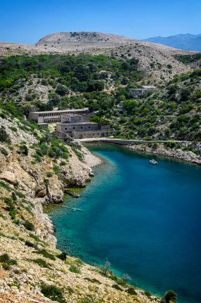 Goli otok (Naked Island) was a political prison in ex-Yugoslavia. Conditions were very harsh, many people died and underwent brutal phisycal and mental torture. It was impossible to escape from it.