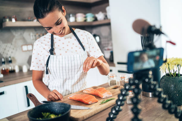 cooking and vlogging - fish spice imagens e fotografias de stock