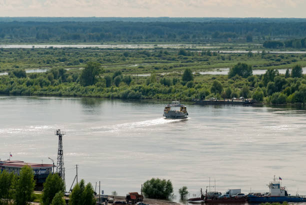 istock Little ferry is transported through Irtysh river 1175393613