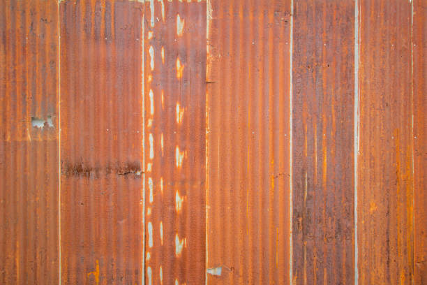 Old Zinc rust texture background, close up to pattern texture vertical zinc sheet. Abstract  Image of Rusty corrugated metal vintage background view. Wall steel older dirty grunge surface fence house.
