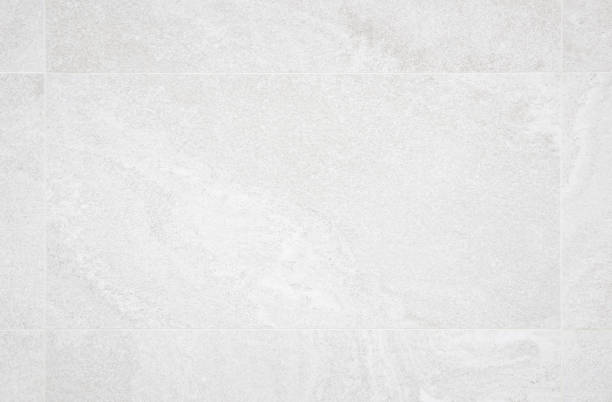 istock White concreted wall for interiors or outdoor exposed surface polished concrete. Cement have sand and stone of tone vintage, natural design art work floor texture background. 1175395535