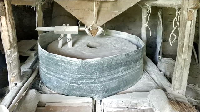 Water mill stone is grinding