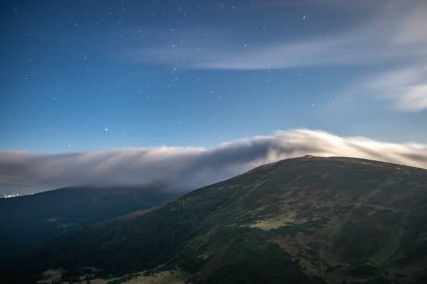 istock Moonlit night in the Carpathian mountains 1175397459