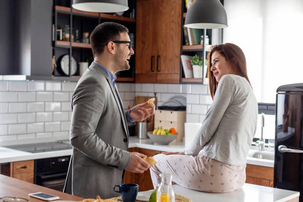 istock Couple eat at the morning before husband go to work in the kitchen 1175400480