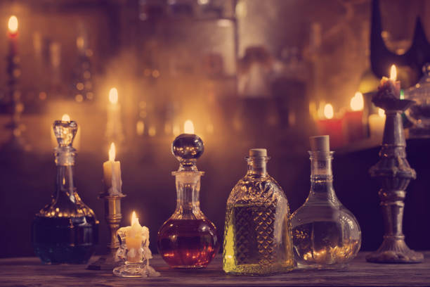 istock magic potions in bottles on wooden background 1175400602