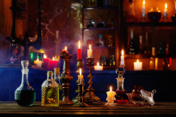 istock magic potions in bottles on wooden background 1175400611