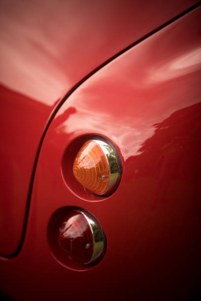 istock Red tail light of a classical vintage car 1175400678