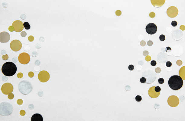 istock Gold, silver, black and white confetti 1175402652
