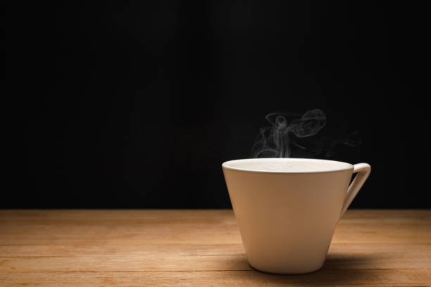 istock Close up white coffee cup or tea on wooden table cafe,copy space for text. 1175405813