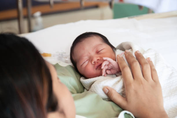 istock Mother and kid in the holding 1175406045