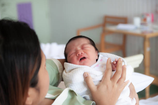 istock Mother and kid in the holding 1175406594