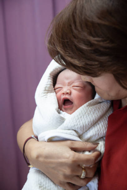 istock Mother and kid in the holding 1175406735