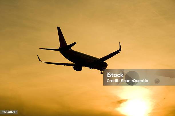 Sunset Landing Stock Photo - Download Image Now - Air Pollution, Air Vehicle, Airplane