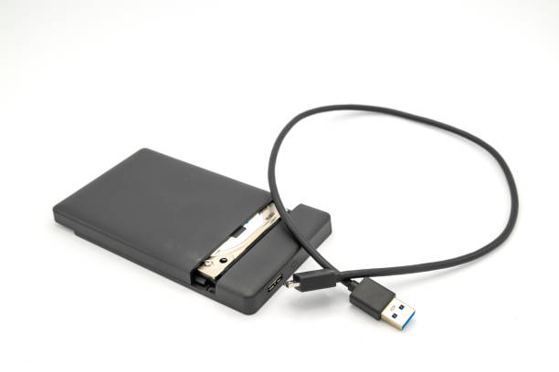 istock portable hard disk drive and USB 3.0 cable isolated on white background 1175408090