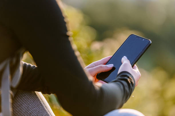istock Sporty woman using phone 1175409277