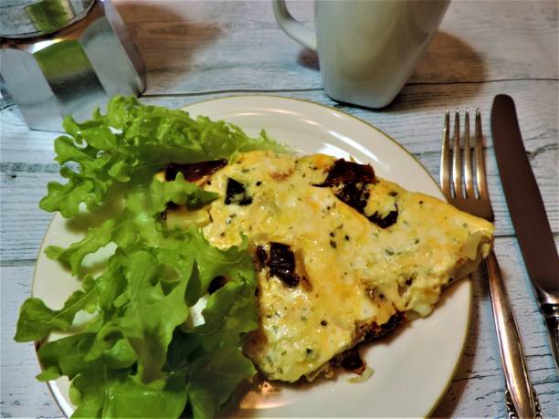 Frittata with green lettuce. Breakfast.