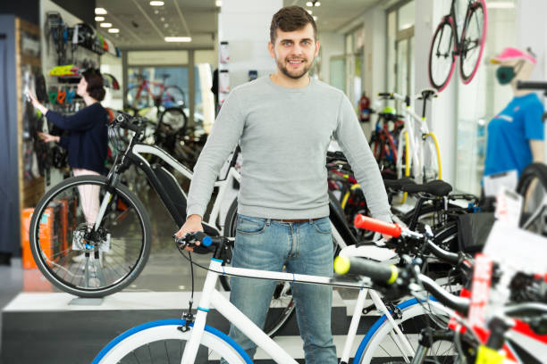 istock male standing near the bicycle 1175416392