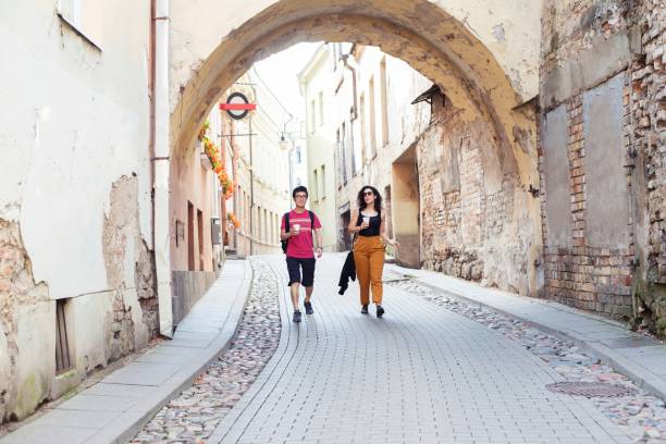 istock Traveler exploring his destination with the help of a local guide 1175416558