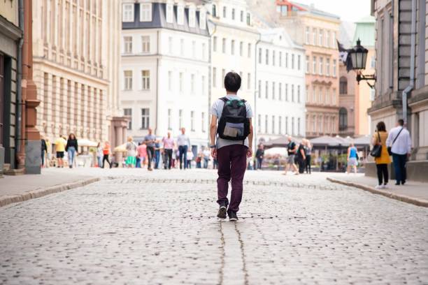 istock Traveler exploring his destination on foot 1175423951