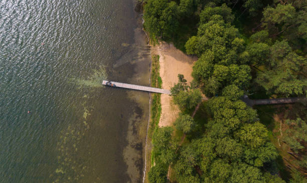 istock pier on the lake. 1175425427