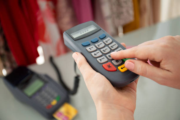 istock Woman enters pin code payment purchase pay pass online terminal 1175426092