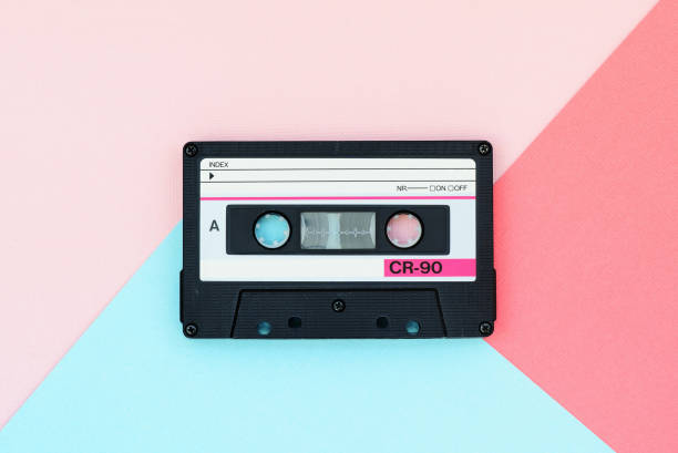 istock Old audio tape cassette on a multicolor background. Top view, old technology concept 1175427114