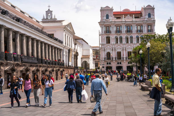 Day in center of Quito at Plaza Grande, Ecuador Quito, Ecuador - February 22, 2019: Street view on center of the city Quito, capital city of Ecuador. Activity in the Plaza Grande or Independence Square in the colonial, historical center of Quito, Ecuador quito photos stock pictures, royalty-free photos & images