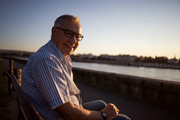 istock Happy senior man enjoying sunset 1175431149