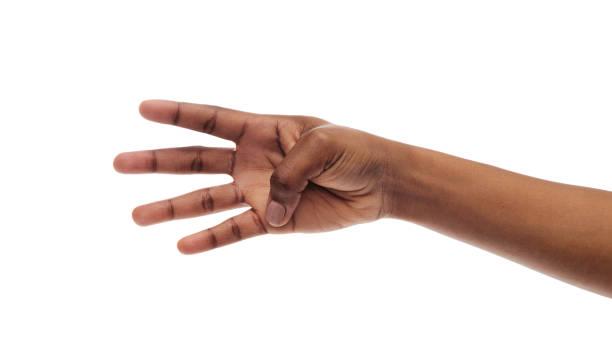 istock Female hand showing number four with fingers on white background 1175432562