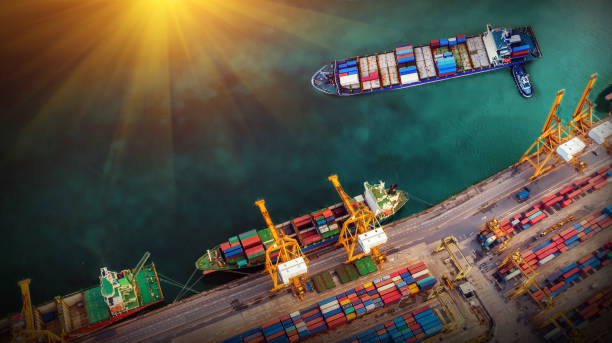 istock Logistics and transportation of Container Cargo ship and Cargo plane with working crane bridge in shipyard at sunrise, logistic import export and transport industry background 1175435855