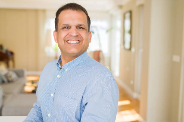 istock Middle age man smiling confident to the camera at home 1175440771