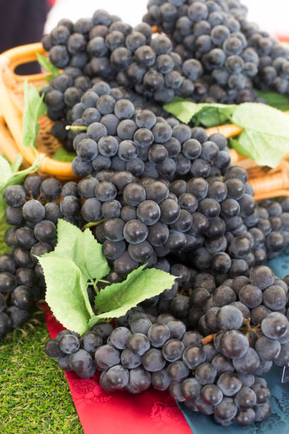 istock Basket full of fresh red grapes. 1175441916