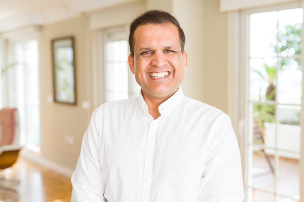 istock Middle age man smiling confident to the camera at home 1175442056