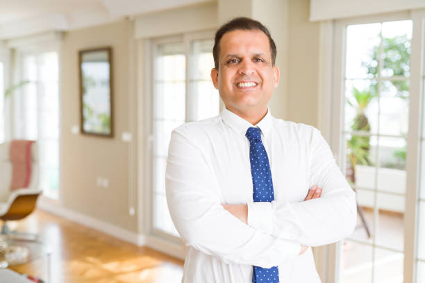 istock Middle age business man smiling to the camera 1175442224