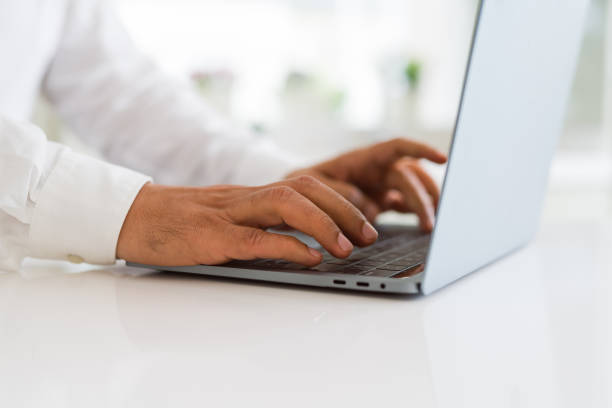 istock Close up of business man working using computer laptop 1175442328
