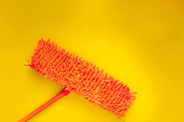 istock new mopping stick isolated on color background, cleaning housework concept 1175446425